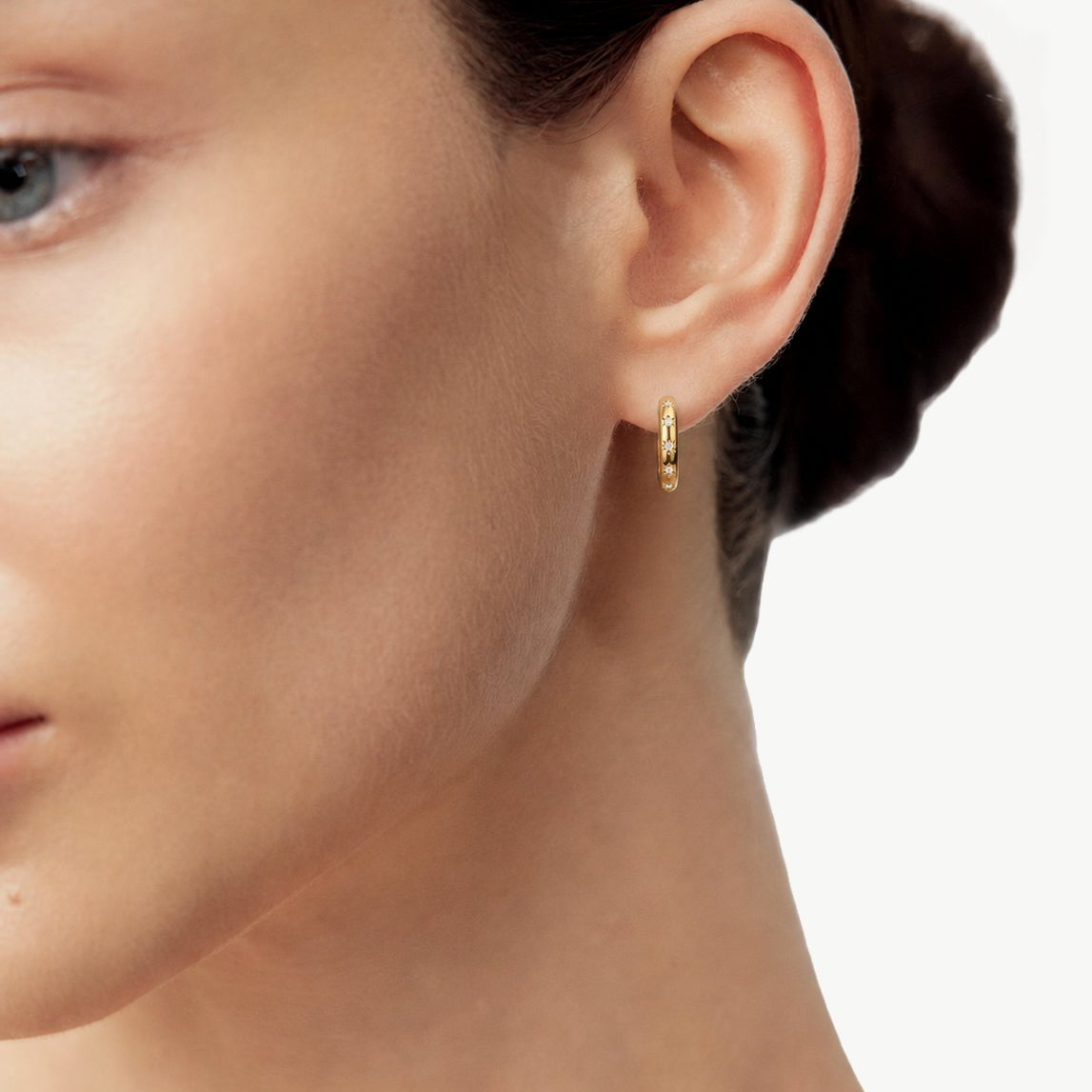 Gold Celestial Star Huggie Earrings | Belvria