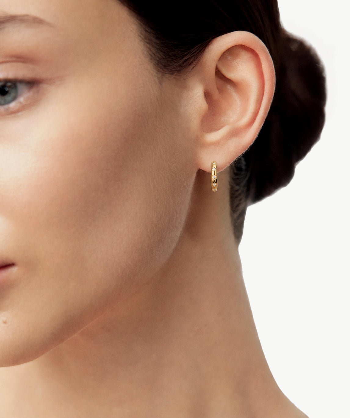 Gold Celestial Star Huggie Earrings | Belvria