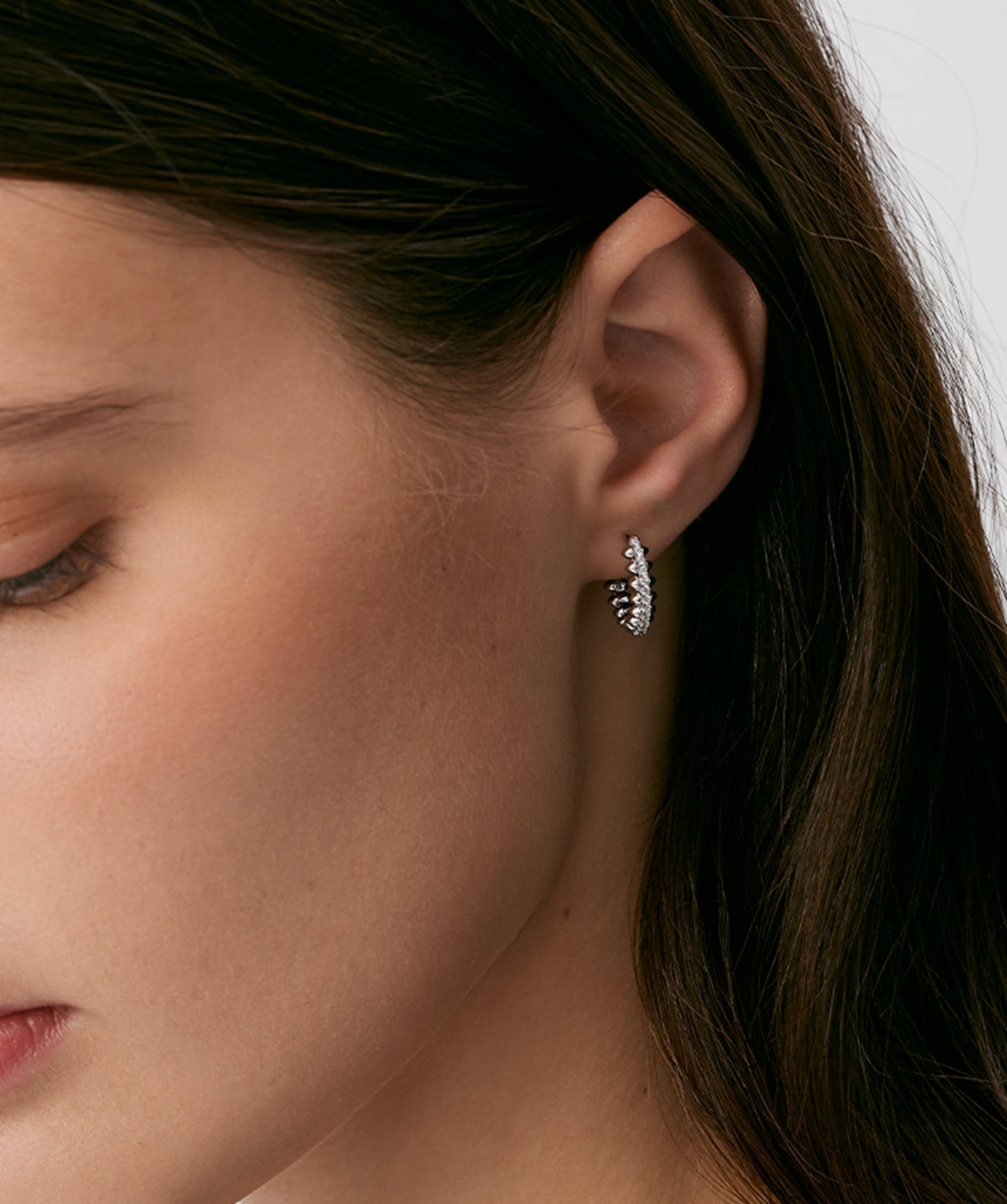 Silver Spiked Huggie Earrings | Belvria